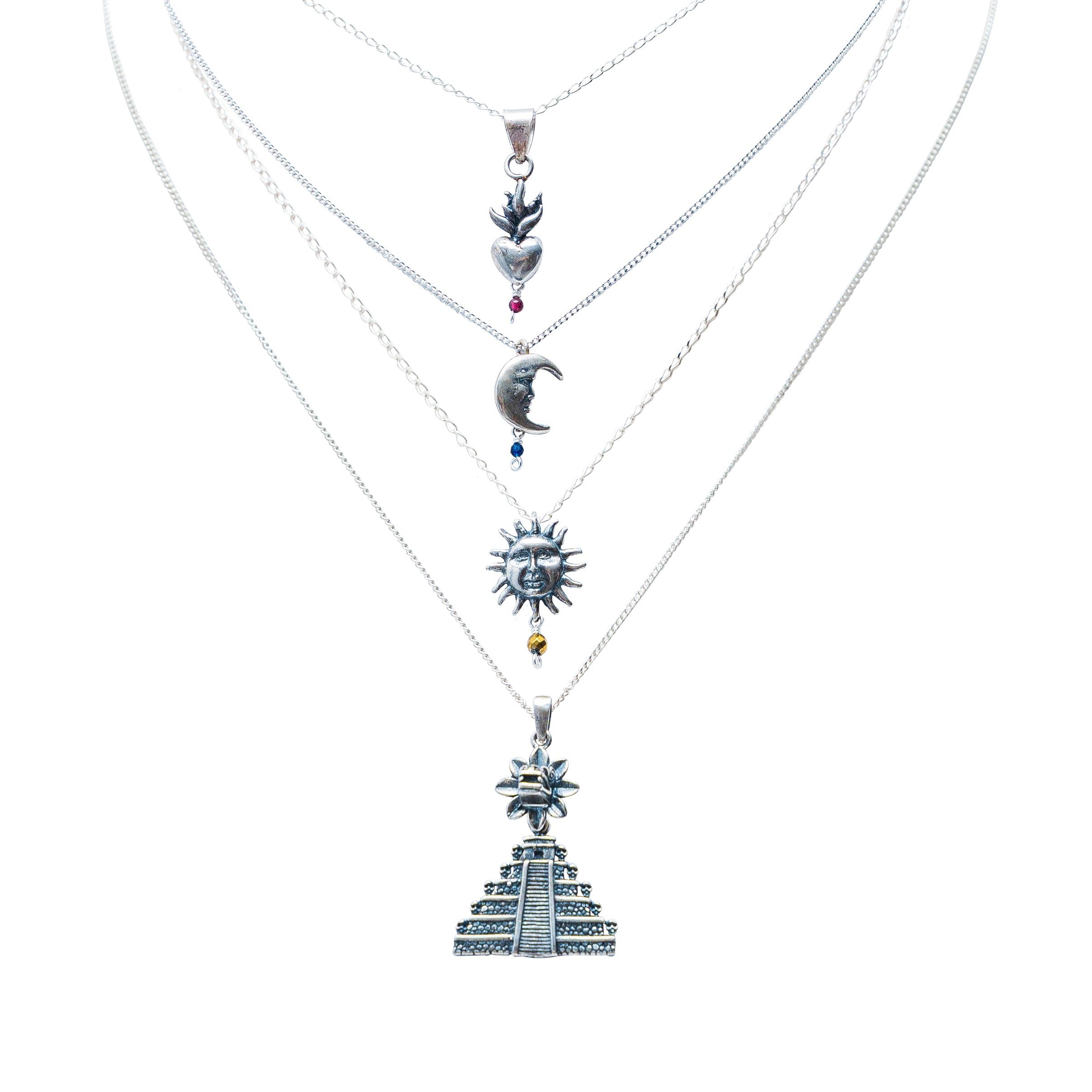 Set Rituales Sagrados, joya de plata .925, con hematita y coral – Gabriela Sánchez