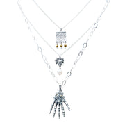 Set Huesitos de Plata, joya de plata .925, con hematita y perla – Gabriela Sánchez (vista 2)