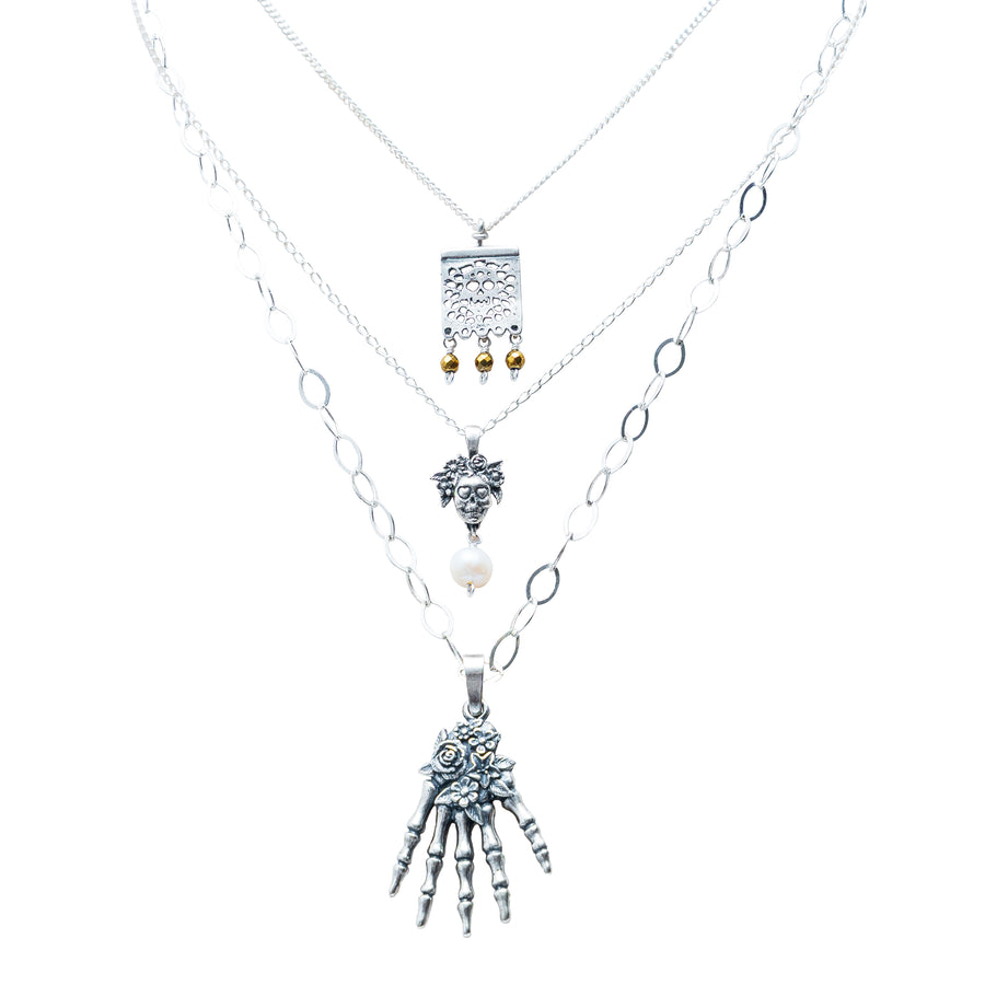 Set Huesitos de Plata, joya de plata .925, con hematita y perla – Gabriela Sánchez (vista 2)