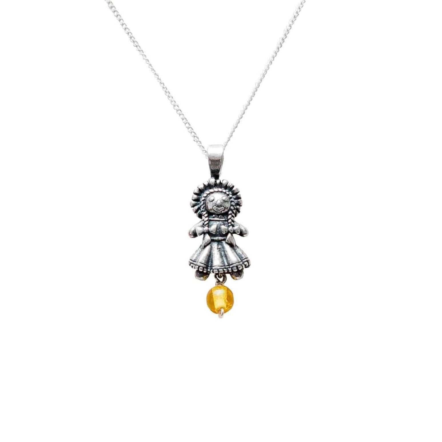 Dije Muñeca Mini con Ámbar, joya de plata .925 – Gabriela Sánchez