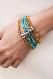 Pulsera Mi Niño, joya de plata .925, con turquesa y ámbar – Gabriela Sánchez