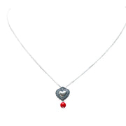 Dije Corazón bordado Coral, joya de plata .925 – Gabriela Sánchez
