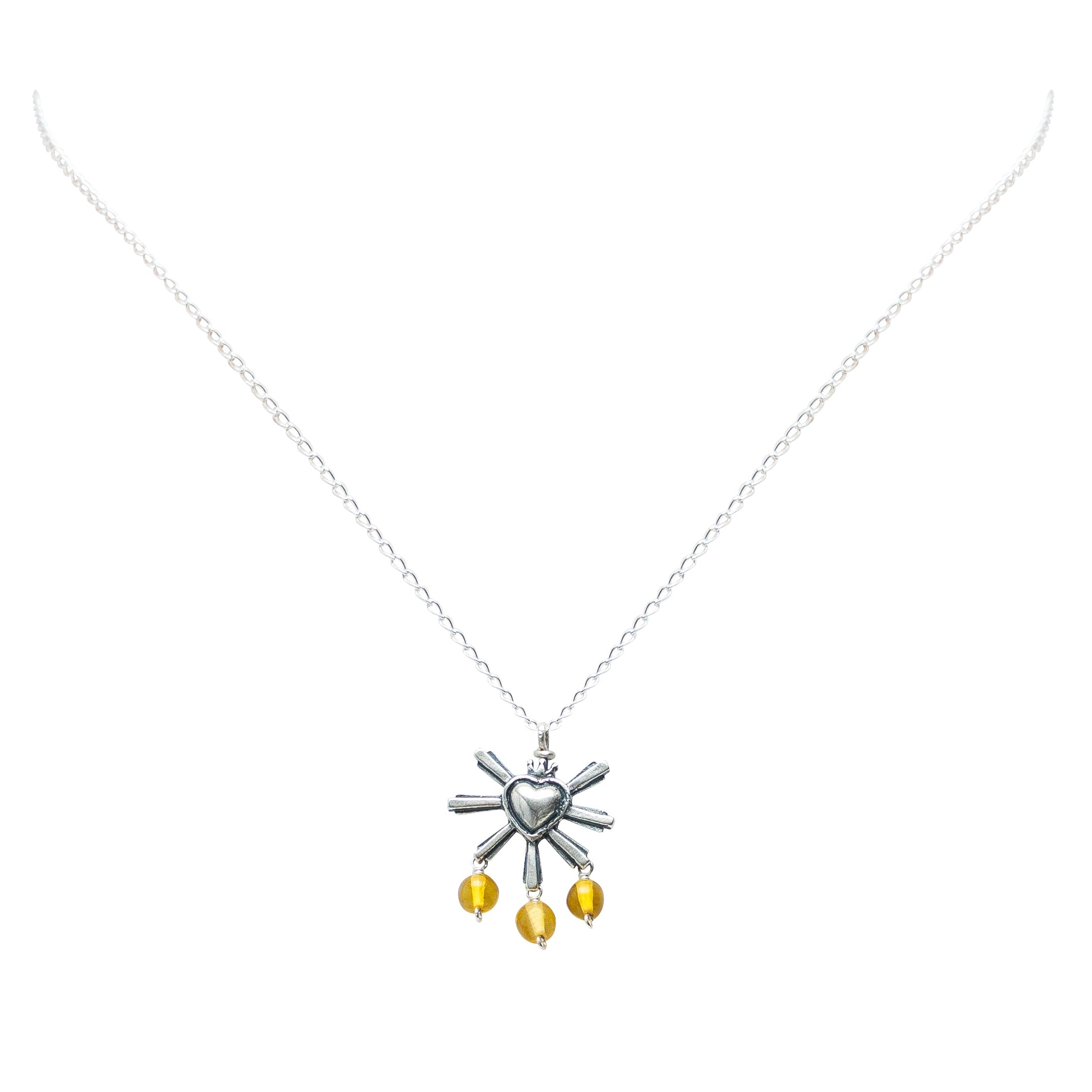 Dije Corazón de Miel, joya de plata .925, con ámbar – Gabriela Sánchez