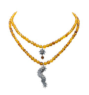 Collar Ascenso Sagrado de Quetzalcóatl, joya de plata .925, con ámbar – Gabriela Sánchez
