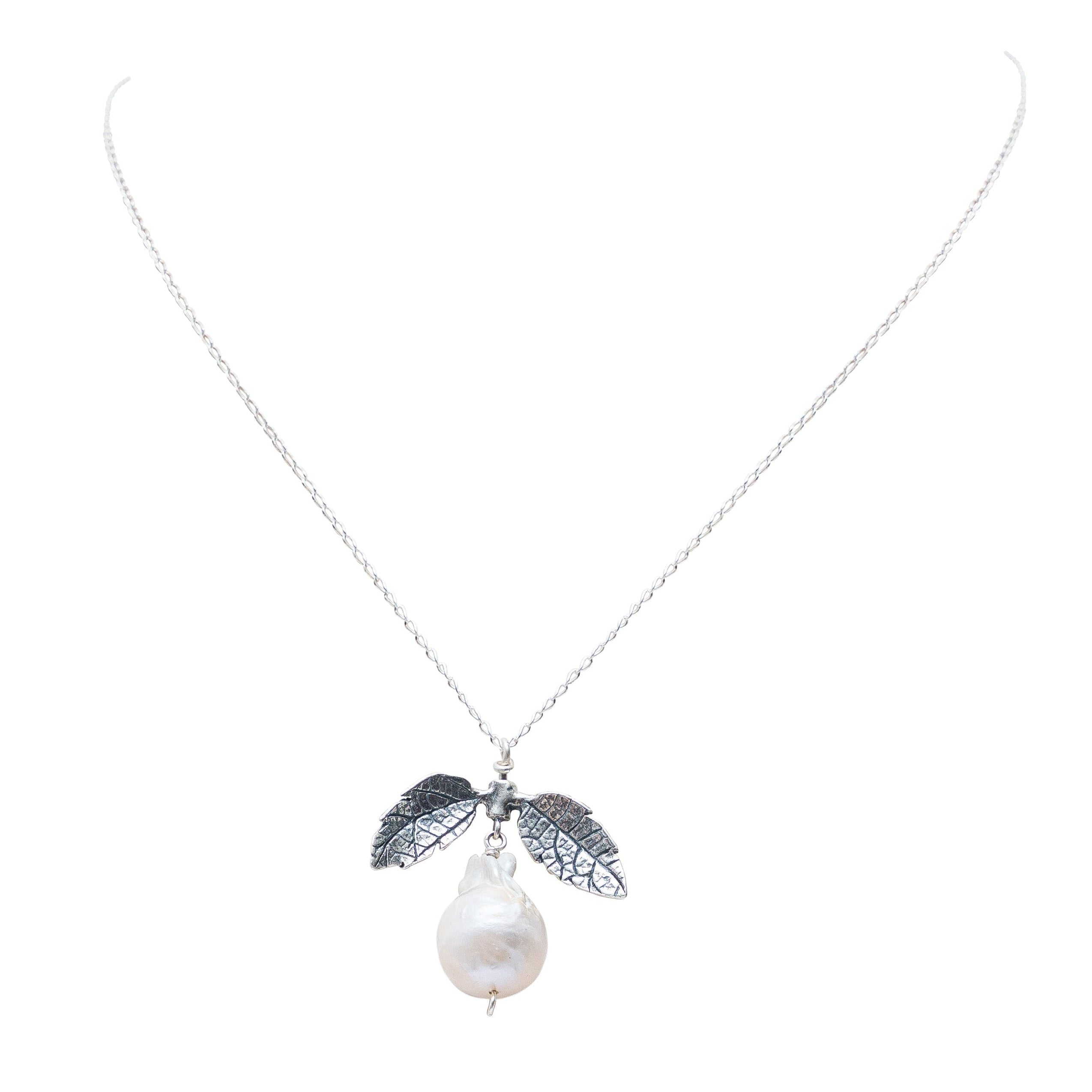 Dije Frutos del Río, joya de plata .925, con perla – Gabriela Sánchez