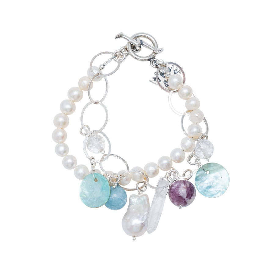 Pulsera Ola, joya de plata .925, con perla y cuarzo – Gabriela Sánchez