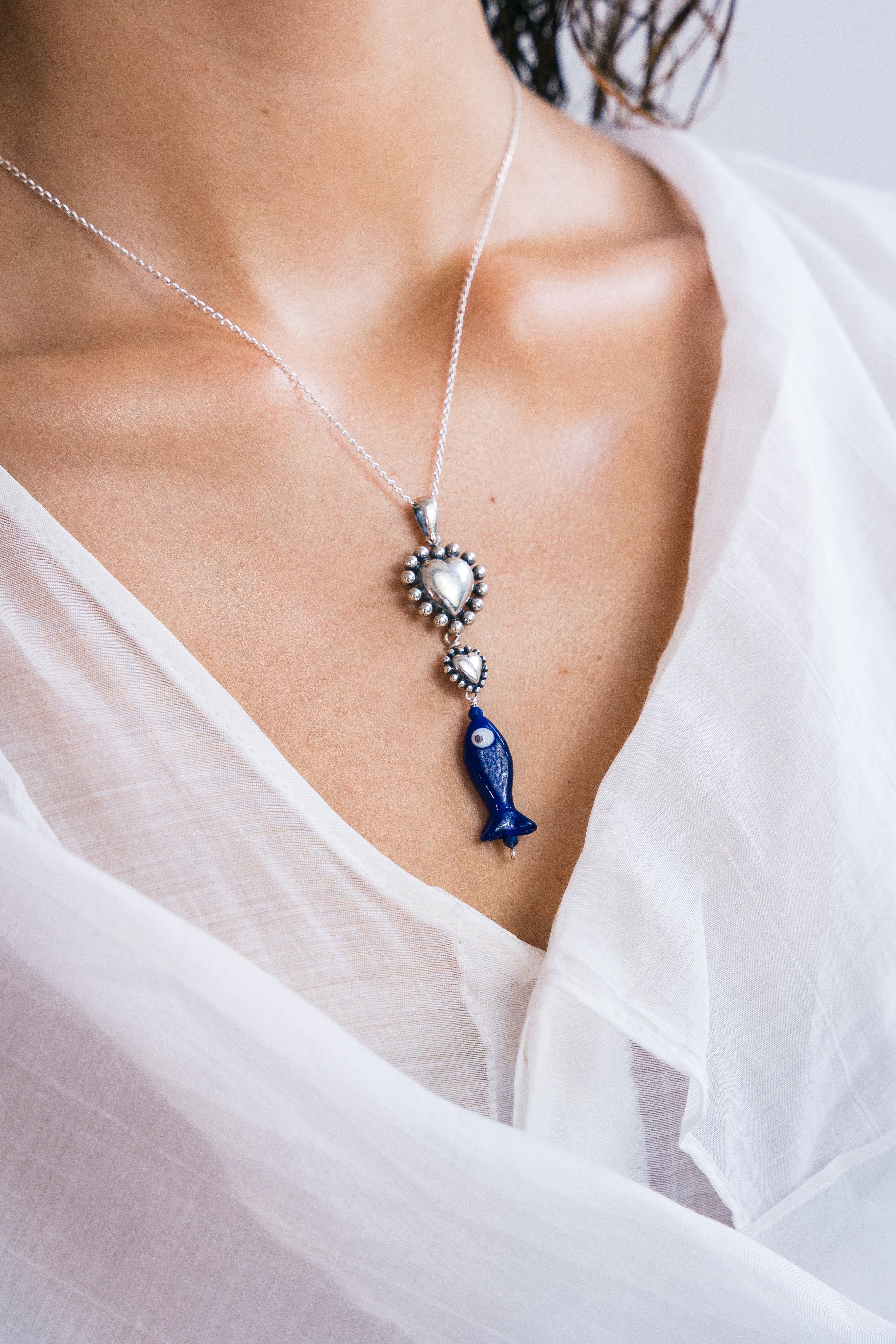 Dije Besitos Marinos, joya de plata .925, con cristal de Murano – Gabriela Sánchez