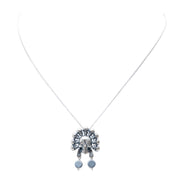Dije Cráneos Tzompantli, joya de plata .925, con hematita – Gabriela Sánchez