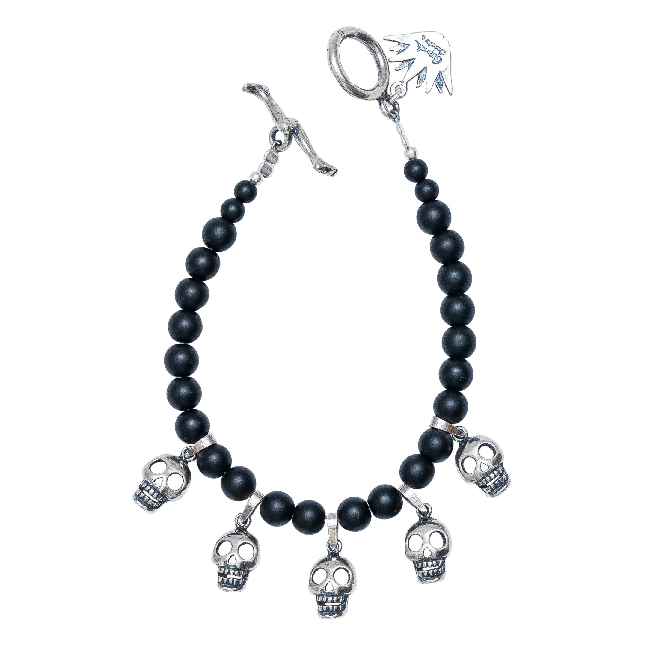 Pulsera Cráneos de Barro Negro, joya de plata .925, con obsidiana – Gabriela Sánchez