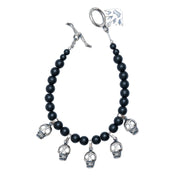 Pulsera Cráneos de Barro Negro, joya de plata .925, con obsidiana – Gabriela Sánchez