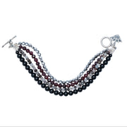Pulsera Fuego Sagrado, joya de plata .925, con ónix y hematita – Gabriela Sánchez (vista 2)