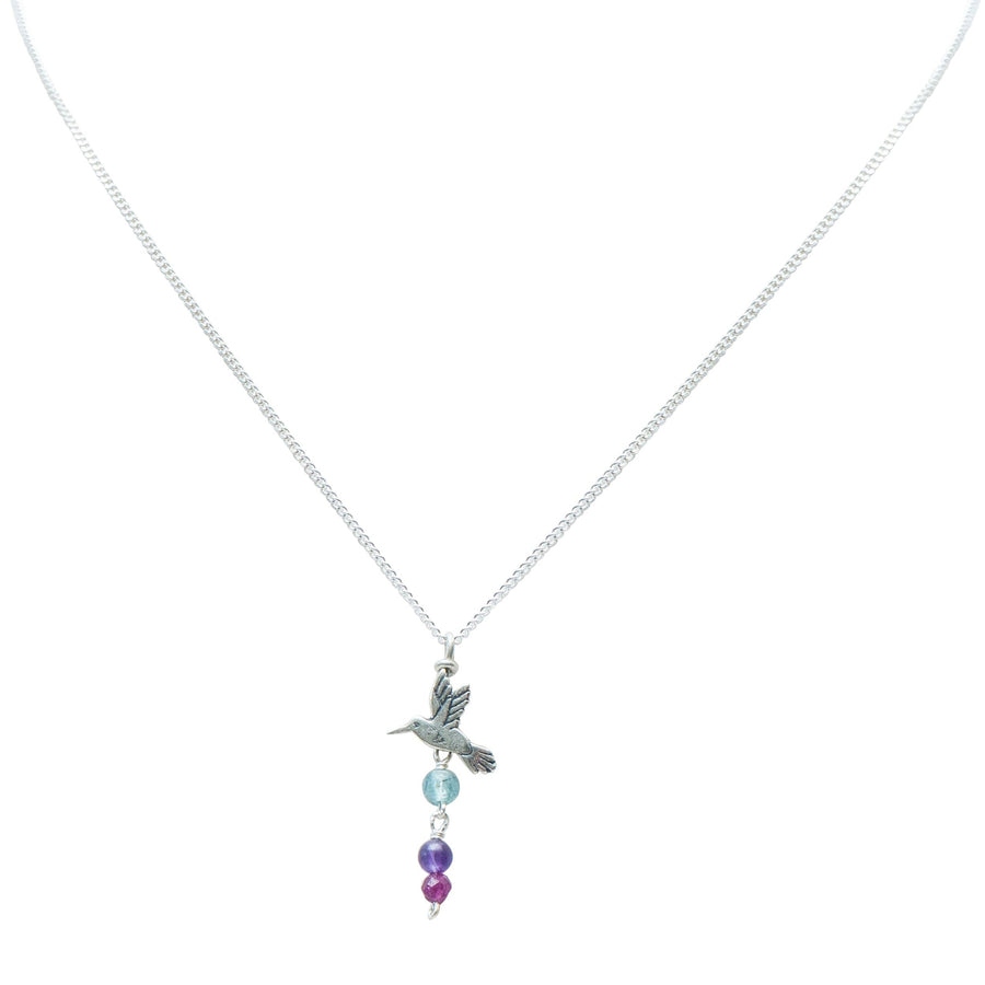 Dije Dulce Vuelo, joya de plata .925, con aquamarina y rubí – Gabriela Sánchez