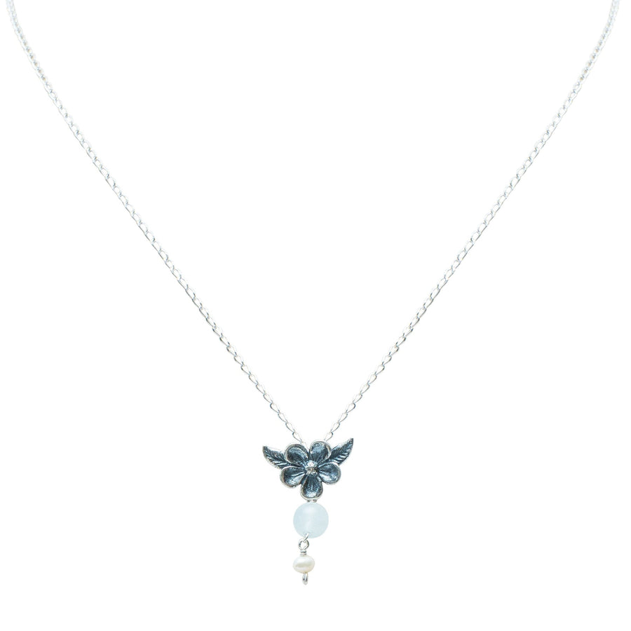 Dije Flores de Amor, joya de plata .925, con aquamarina y perla – Gabriela Sánchez
