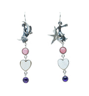 Aretes Bajo el Cielo de Mamá, joya de plata .925, con concha y amatista – Gabriela Sánchez