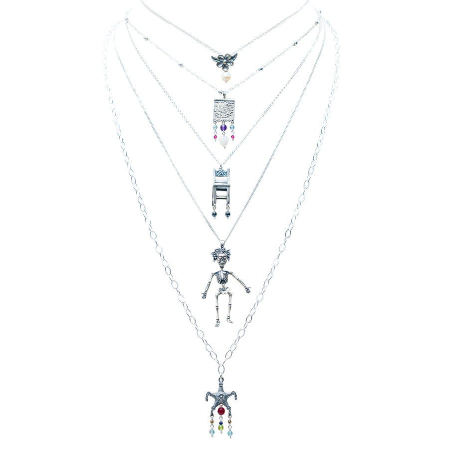 Set Ojos de Papel Volando, joya de plata .925, con perla y concha – Gabriela Sánchez
