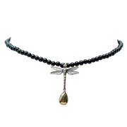 Collar Libélula Azabache, joya de plata .925, con ónix y pirita – Gabriela Sánchez
