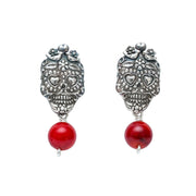 Aretes Calavera Coloradita, joya de plata .925, con coral – Gabriela Sánchez