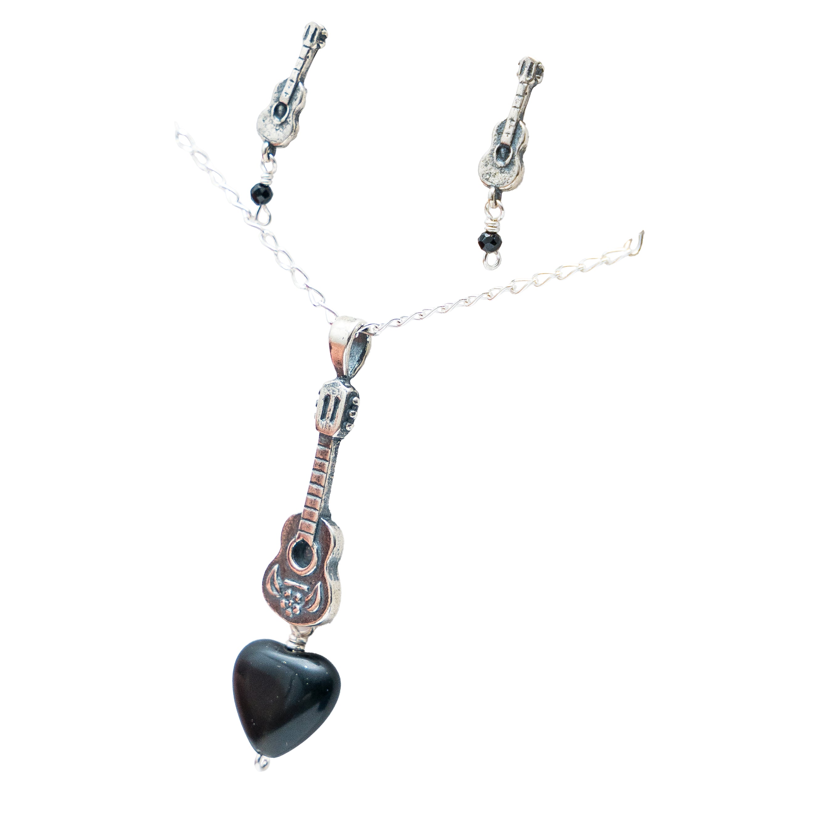 Set guitarras, joya de plata .925, con ónix – Gabriela Sánchez