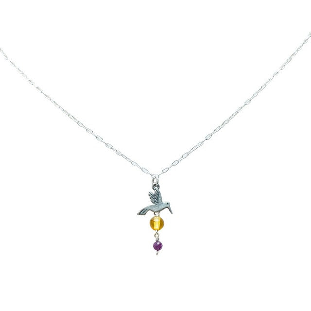 Dije Colibrí Cantor, joya de plata .925, con ámbar y fosforita – Gabriela Sánchez