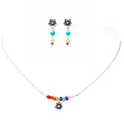 Set Arcoíris de Flores, joya de plata .925, con rubí y gemas de colores – Gabriela Sánchez
