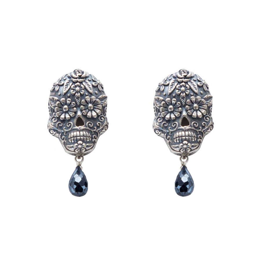 Aretes Calavera Ojos Flor Gota, joya de plata .925, con hematita – Gabriela Sánchez